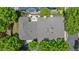 Aerial view of a charming home with a well-maintained roof and mature trees at 175 Centennial Trce, Roswell, GA 30076