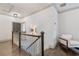 Bright hallway with hardwood floors, chair, and elegant trim, creating a welcoming space at 175 Centennial Trce, Roswell, GA 30076