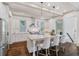 Bright, open kitchen featuring stainless steel appliances, granite countertops and hardwood floors at 175 Centennial Trce, Roswell, GA 30076