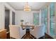 Bright home office featuring modern decor, hardwood floors and windows with plantation shutters at 175 Centennial Trce, Roswell, GA 30076