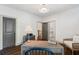 Office features neutral walls, hardwood floors, and an open doorway to bathroom and stairs at 175 Centennial Trce, Roswell, GA 30076