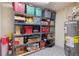 Basement storage room features shelving, water heater, and organized storage bins at 175 Centennial Trce, Roswell, GA 30076