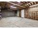 Unfinished basement area with concrete floor and exposed ceiling and walls ready for finishing touches at 2528 Chimney Springs Dr, Marietta, GA 30062