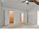 This bedroom has a walk-in closet and an en-suite bathroom at 2528 Chimney Springs Dr, Marietta, GA 30062