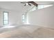 Bright bedroom features large windows, high ceilings, and carpeted floors at 2528 Chimney Springs Dr, Marietta, GA 30062
