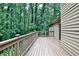Charming wooden deck with forest views, offering a peaceful retreat with exterior access at 2528 Chimney Springs Dr, Marietta, GA 30062