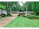 Ranch home with well-manicured lawn, mature trees, and lovely landscaping, ready for move-in at 2528 Chimney Springs Dr, Marietta, GA 30062