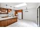 Eat-in kitchen features a stylish island, white countertops, and stainless steel appliances at 2528 Chimney Springs Dr, Marietta, GA 30062