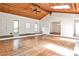 Open-concept living space with hardwood floors, a decorative fireplace, and ample natural light at 2528 Chimney Springs Dr, Marietta, GA 30062