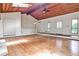 Spacious living room with wood ceiling, hardwood floors, and lots of natural light at 2528 Chimney Springs Dr, Marietta, GA 30062