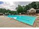 Large outdoor pool with surrounding lounge areas, a great place to unwind and soak up the sun at 2528 Chimney Springs Dr, Marietta, GA 30062
