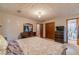 Cozy bedroom featuring neutral tones, a comfortable bed, and a closet for organized storage at 2645 Holly Berry Trl, Snellville, GA 30039