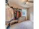 Bedroom with closet organizer for maximizing storage space at 2645 Holly Berry Trl, Snellville, GA 30039