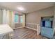 Bright dining room with wood floors, natural light, and open access to other rooms at 2645 Holly Berry Trl, Snellville, GA 30039