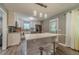 Modern kitchen with white cabinetry, stainless steel appliances, and sleek countertops at 2645 Holly Berry Trl, Snellville, GA 30039