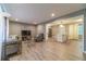 Bright living room with modern furnishings and open layout to the kitchen at 2645 Holly Berry Trl, Snellville, GA 30039