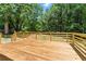 Expansive wooden deck with wood railings providing a great outdoor living space at 3013 Michael Sw Dr, Marietta, GA 30060