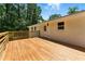 Expansive wooden deck with wood railings providing a great outdoor living space at 3013 Michael Sw Dr, Marietta, GA 30060