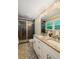 A sleek bathroom offers dual sinks, stylish fixtures, and a glass enclosed shower at 3597 Embry Cir, Atlanta, GA 30341