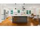 Kitchen with hardwood floors, stainless steel appliances, and a center island with granite countertop at 3597 Embry Cir, Atlanta, GA 30341