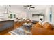 Open concept living room and kitchen with hardwood floors and plenty of natural light at 3597 Embry Cir, Atlanta, GA 30341