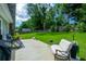 Comfortable patio space, perfect for outdoor relaxation and entertaining, in a large, well-maintained backyard at 4016 Dover Ave, Alpharetta, GA 30009