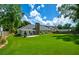 Expansive backyard features a well-maintained lawn and patio area, ideal for gatherings and outdoor enjoyment at 4016 Dover Ave, Alpharetta, GA 30009