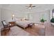 Bright primary bedroom with vaulted ceilings, hardwood floors, and natural light at 4016 Dover Ave, Alpharetta, GA 30009