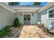 The front entrance welcomes you with a stone pathway, seating, and double doors adorned with wreaths at 4016 Dover Ave, Alpharetta, GA 30009