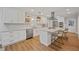 Modern kitchen with white cabinets, granite countertops, and stainless steel appliances at 4016 Dover Ave, Alpharetta, GA 30009