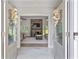 Inviting living room view through double doors, featuring a stone fireplace and open layout at 4016 Dover Ave, Alpharetta, GA 30009