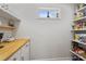 Well-organized pantry with ample shelving and countertop space at 4016 Dover Ave, Alpharetta, GA 30009