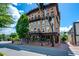 Charming street view featuring a brick building with restaurants and shops in a walkable downtown area at 4016 Dover Ave, Alpharetta, GA 30009