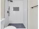 Shower with tiled walls, a rainfall shower head, and a built-in niche at 404 Hawkstone Way, Alpharetta, GA 30022