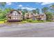 Charming townhomes with ample parking and well-maintained landscaping at 404 Hawkstone Way, Alpharetta, GA 30022