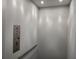 Interior view of residential elevator with access buttons and safety handrail at 5715 Rocky Falls Drive, Suwanee, GA 30024