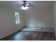 Bedroom showcasing flooring and a bright window with natural light at 1380 Ashbrook Dr, Lawrenceville, GA 30043