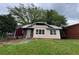 Charming single-story home featuring stone veneer, a metal roof and a yard, ready for personalization at 1422 Boulevard Se, Atlanta, GA 30315