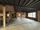 Interior view of the house, exposing wood beams, framing, and a fireplace at 1422 Boulevard Se, Atlanta, GA 30315