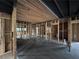 Open-concept home with exposed wood beams, framing, and wood floors at 1422 Boulevard Se, Atlanta, GA 30315
