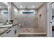 Tiled walk-in shower and granite counter tops highlight this bathroom at 3656 Ebenezer Rd, Marietta, GA 30066