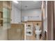 Modern bathroom featuring glass shower, tile walls, and a built-in shelf at 3656 Ebenezer Rd, Marietta, GA 30066