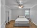 Bright bedroom with a ceiling fan, a single bed, and hardwood floors at 3656 Ebenezer Rd, Marietta, GA 30066