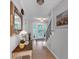 Welcoming entryway featuring a staircase, stylish decor, and ample natural light at 3656 Ebenezer Rd, Marietta, GA 30066