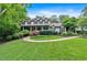 Inviting two-story home with a charming front porch and meticulously landscaped front yard at 3656 Ebenezer Rd, Marietta, GA 30066