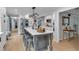 Bright kitchen with large island with seating, stainless steel appliances, and modern finishes at 3656 Ebenezer Rd, Marietta, GA 30066