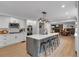 Open concept kitchen features large island, bar stool seating, and stainless steel appliances at 3656 Ebenezer Rd, Marietta, GA 30066
