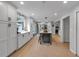 Bright, white kitchen with modern cabinets, stainless steel appliances, and an island at 3656 Ebenezer Rd, Marietta, GA 30066