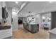 Open concept kitchen features a large island with seating and stainless steel appliances at 3656 Ebenezer Rd, Marietta, GA 30066