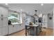 Bright, white kitchen with modern cabinets, stainless steel appliances, and an island at 3656 Ebenezer Rd, Marietta, GA 30066